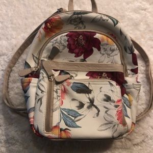 Womens cream colored with flower design backpack